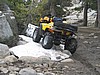043. Larry parks his on a small patch of snow..jpg