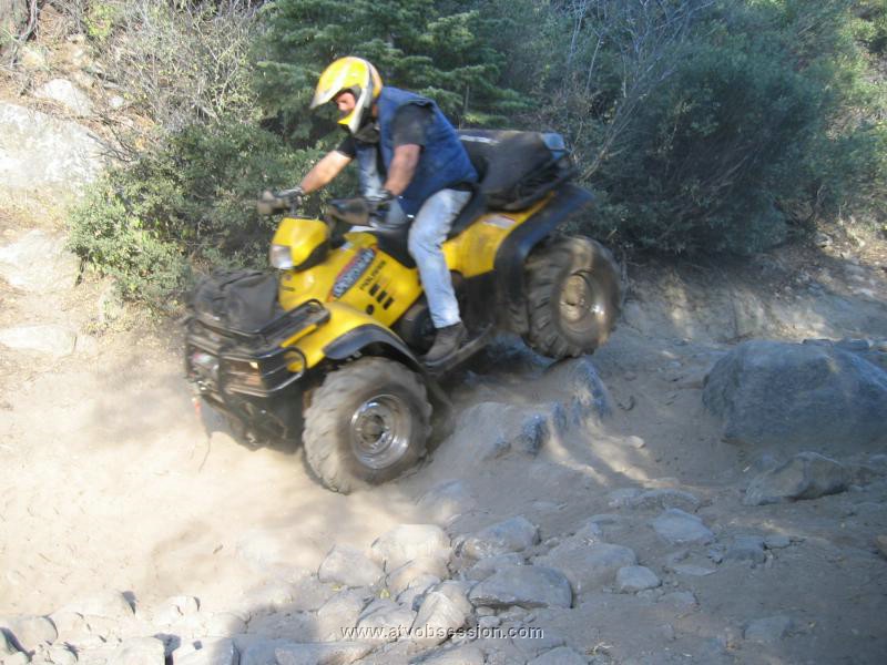 06. Larry goes over a boulder on Cadillac Hill..jpg