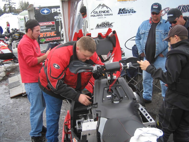 12. Chadd works on a sled before the drags..jpg