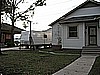 44. A typical sight...moldy house and them living in a FEMA trailer..jpg