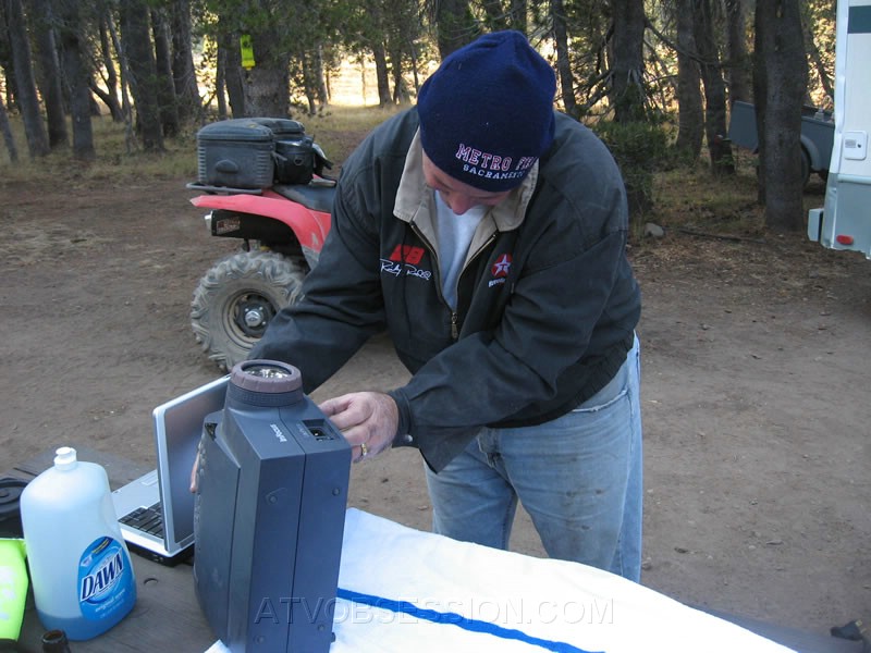 113. Larry sets up the projector...It's Sled Heads III tonight..jpg