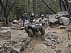 055. Wayne heads down a tricky section while Bill walks along side..jpg