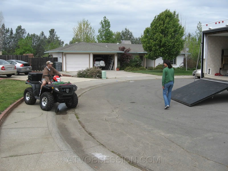 005. Lori and Dusty chat as he unloads his quad..jpg