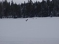 53. Skiers walking across the lake..jpg