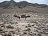 202. Lori stands before the Quad Gods at our last mine..jpg